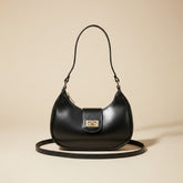 Elegant Black Handbag with Gold Detailing