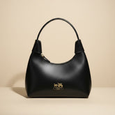Elegant Black Leather Handbag with Gold Accents
