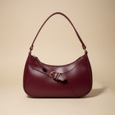 Elegant Burgundy Handbag with Gold Buckle