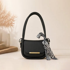 Chic Black Handbag with Zebra-Print Silk Bow