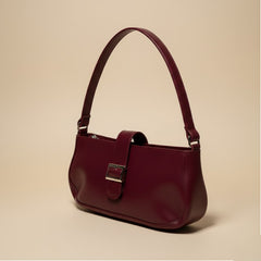 Chic Maroon Handbag with Modern Buckle