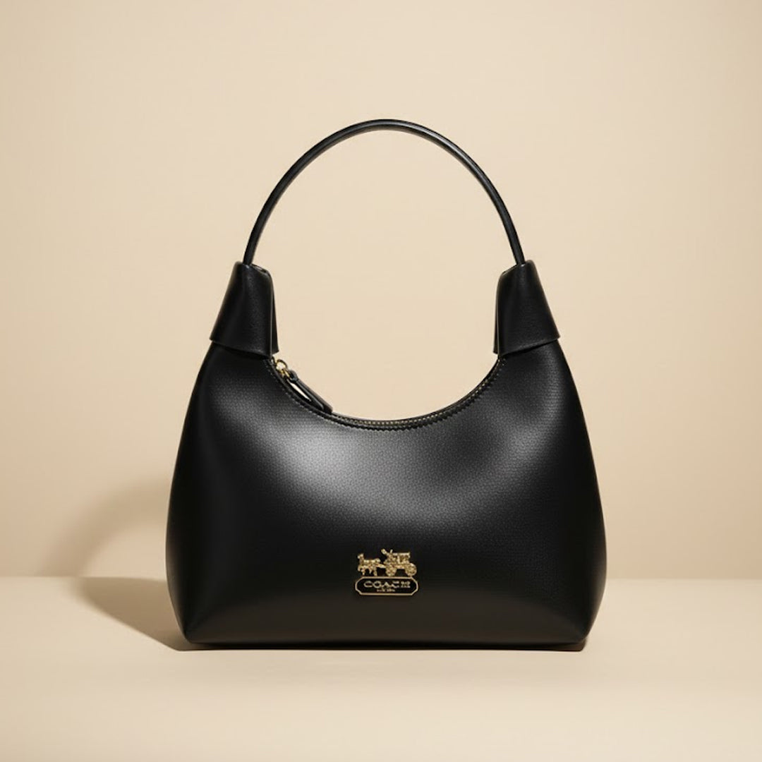 Elegant Black Leather Handbag with Gold Accents